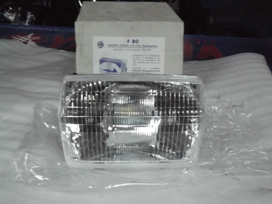 GRUPPO OTTICO FARO RETTANGOLARE PER PEUGEOT METROPOLIS SC 50 HONDA LEAD NR 50